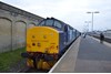 Unusually routed into platform 4 at Lowestoft, 37405 stands at the 'stops' with the 1455 from Norwich. The train returned as the 1548 to Norwich with 37419 leading. Unusually routed into platform 4 at Lowestoft, 37405 stands at the 'stops' with the 1455 from Norwich. The train returned as the 1548 to Norwich with 37419 leading.
