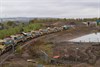 Freightliner Heavy Haul 66602 (with FLHH 66605 bringing up the rear) hauls the 3,000 tonne ballast train as it deposits its load approaching Shawfair station on October 13.