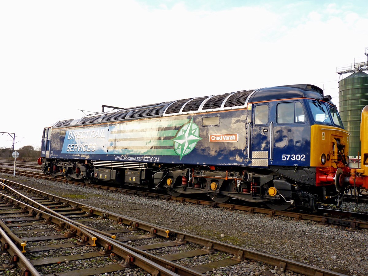 By November 2012, Direct Rail Services had three Class 57/3s on its books. One of the locomotives, 57302 Chad Varah, waits for its next working at Crewe Gresty Bridge. From December 2012, they were deployed on standby duties on the West Coast Main Line, and now DRS has 12 Class 57/3s.