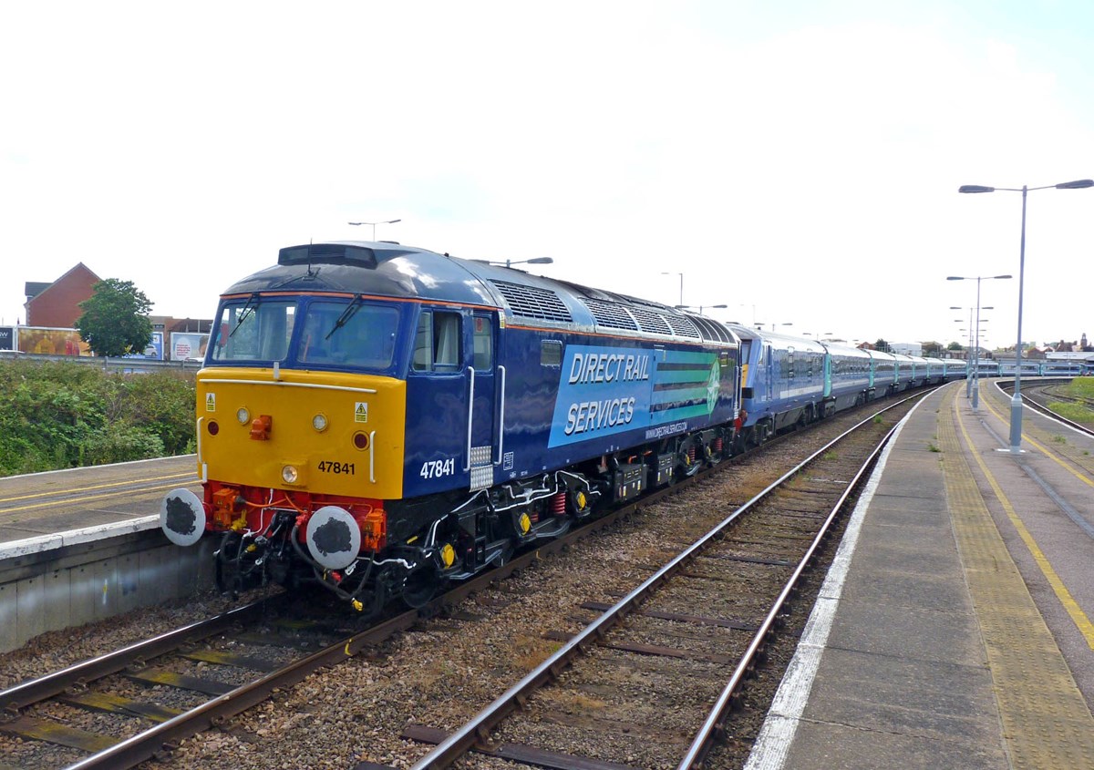 A freshly repainted Direct Rail Services 47841 stands at Great Yarmouth on August 3 2013, with the 1625 empty coaching stock to Norwich. RICHARD CLINNICK. A freshly repainted Direct Rail Services 47841 stands at Great Yarmouth on August 3 2013, with the 1625 empty coaching stock to Norwich. RICHARD CLINNICK.