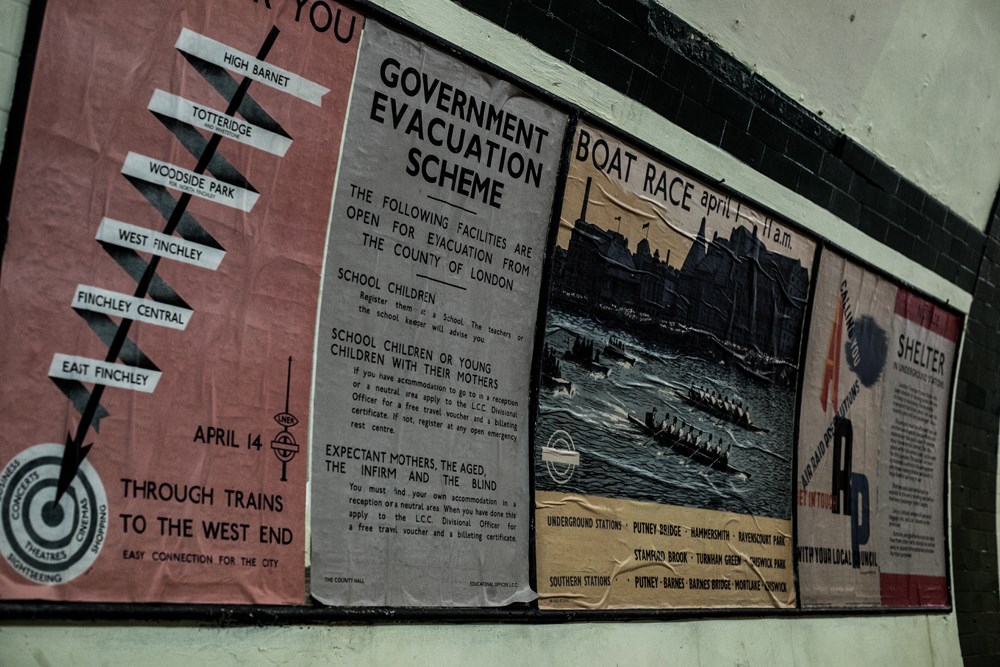 Posters on the wall on Platform 1 at Aldwych, put up for a recent wartime film shoot.
