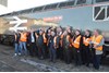 Members of the Lost Boys driving community stand with 56098 following the naming on January 15. RICHARD CLINNICK. Members of the Lost Boys driving community stand with 56098 following the naming on January 15. RICHARD CLINNICK.