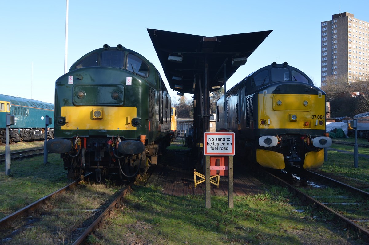 UK Rail Leasing 37905 (left) and Europhoenix 37884 (right) stand at the Leicester depot fuelling point on January 15. RICHARD CLINNICK. UK Rail Leasing 37905 (left) and Europhoenix 37884 (right) stand at the Leicester depot fuelling point on January 15. RICHARD CLINNICK.