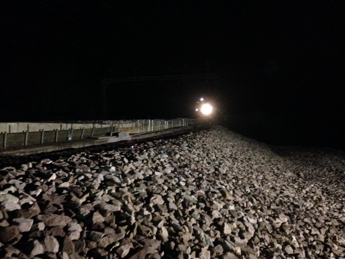 First train at Leighton Buzzard on new embankment