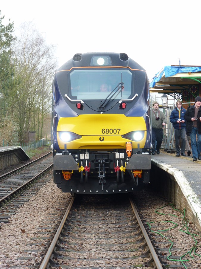 Standing at Thuxton on December 27 2014, Direct Rail Services 68007 Valiant waits with the 1100 Dereham-Wymondham Abbey. Trains cross here, and it was waiting for the 1105 Wymondham Abbey-Dereham, hauled by resident 47596 Aldeburgh Festival.