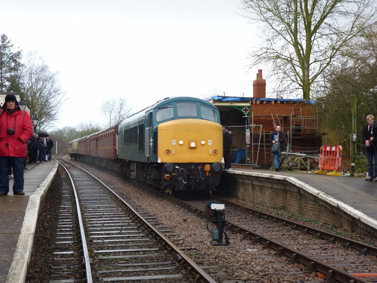 The 1400 Dereham-Wymondham Abbey hauled by 45133 stands at Thuxton on December 27 2014. The Class 45/1 is on a long-term visit to the MNR. By this points trains were running late because of a points failure. The Peak was booked to haul the 1505 Wymondham Abbey-Dereham, which departed an hour late, and was further delayed when the '45' failed outside Dereham, and required rescuing by Direct Rail Services 68007 Valiant. This caused the subsequent 1600 Dereham-Wymondham Abbey, booked to be hauled by the '45' to be cancelled.