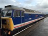 Resplendent in revised Network SouthEast livery, 47596 Aldeburgh Festival stands at Dereham on December 27 2014. It would be joined by 47367, and the pair hauled the 1200 to Wymondham Abbey.