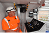 MMT Supervisor Corey White can see all that’s going on in the mobile maintenance car and control the overall train from his desk. Cameras provide external views. PHIL HAIGH