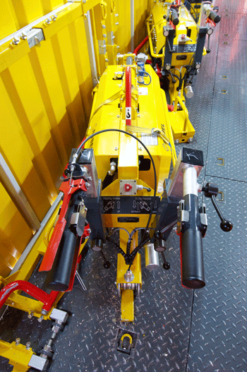This is one of four machines that can insert and remove track clips. PHIL HAIGH