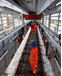 The mobile maintenance car provides light and shelter for track gangs. Pneumatic slats provide ventilation, and the walls include an emergency safety cord as well as power points. PHIL HAIGH