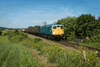 Away from its home line (the Gloucestershire Warwickshire Railway), visiting Class 26 D5343 hauls the 0920 Holt-Sheringham near Weybourne on June 12. This was one of four Type 2s working at the North Norfolk Railway gala, and was the first Class 26 to run on the NNR. It is booked to stay at the railway for a few weeks before returning to the Glos-Warks for its July 24-26 diesel gala. DUNCAN LANGTREE D5343