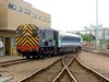 RMS Locotec 08754 stands couple next to Greater Anglia Mk 3 Open First (FO) 11085, which was used by VIPs invited to the depot for the naming.