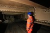 NR Project Manager Greg Thornett looks at the remains of Southwark Park station, hidden in the catacombs under the railway in Bermondsey. NETWORK RAIL.