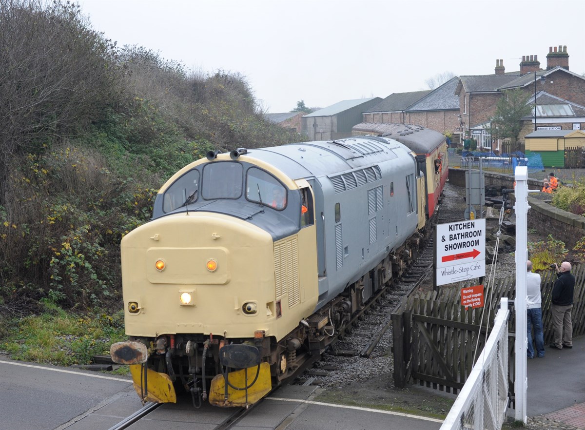 37674 passes Bedale Signal box with the 1200 Leeming Bar-Redmire.