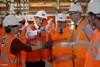 Prince Philip, Duke of Edinburgh is shown around the new Crossrail station taking shape 30 metres below Farringdon in London, where he met some of the apprentices, construction workers and engineers delivering the station on November 4, 2015 in London, United Kingdom. BECHTEL