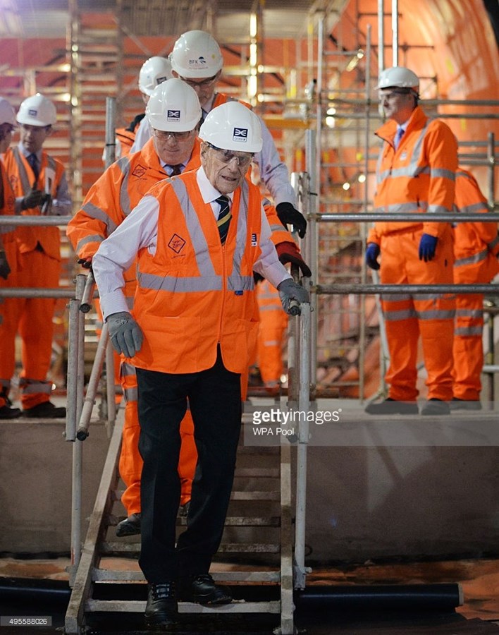 Prince Philip, Duke of Edinburgh is shown around the new Crossrail station taking shape 30 metres below Farringdon in London, where he met some of the apprentices, construction workers and engineers delivering the station on November 4, 2015 in London, United Kingdom. BECHTEL
