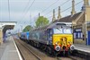 Direct Rail Services 57303 Pride of Carlisle leads an RHTT through Downham Market on October 15. On the rear is DRS 57306, albeit still in Network Rail livery. JOHN RUDD.