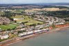 Containers were used to protect the damaged 100-metre section of sea wall at Dawlish after storms demolished it in February 2014 (RAIL 742). A First Great Western High Speed Train passes the motley collection of containers on its way west. First Great Western train at Dawlish