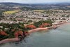 A First Great Western High Speed Train runs between Kennaway Tunnel, the first of five between Dawlish and Teignmouth, and Coryton Tunnel. The latter is the furthest accessible point using the sea wall footpath from Dawlish. First Great Western train at Kennaway Tunnel
