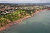 A First Great Western High Speed Train heads for Teignmouth, having passed Sprey Point. This section of the sea wall suffered from landslips. It was also this section that threatened the re-opening of the railway, because of rocks crashing onto the track after being loosened by the heavy rain. On the landward side of the railway remains a lime kiln that was used during the construction of the line here. First Great Western train passes Sprey Point