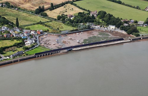 A First Great Western High Speed Train heads west through Cockwood, passing the famous harbour. First Great Western train going through Cockwood