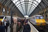 Passengers stream off trains on the first weekday morning operation of VTEC.
