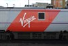 The interim brand on the Class 91 locomotives is a straightforward application of a vinyl over the previous 'East Coast' name, before the full livery treatment can be applied.