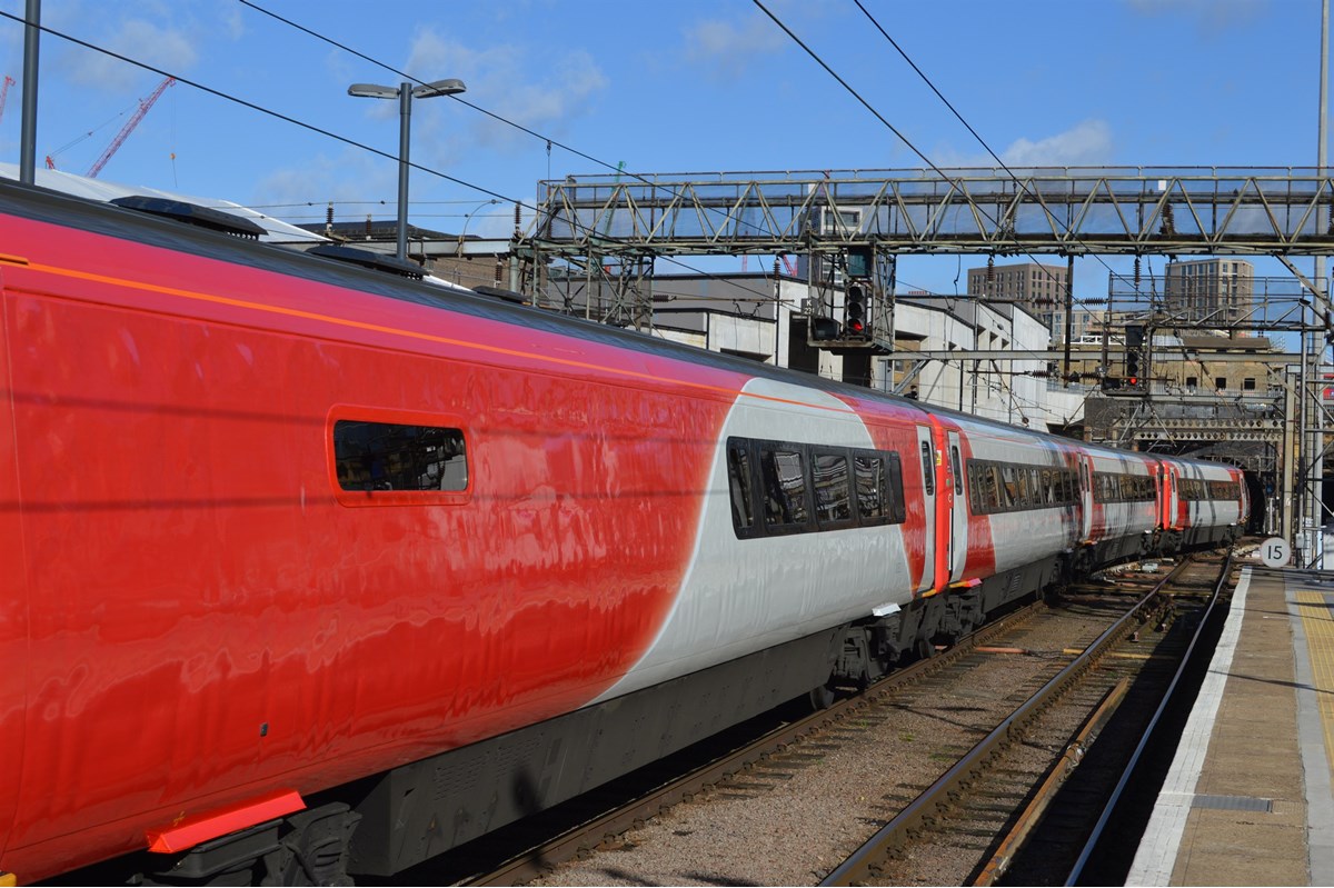 The rake of newly-liveried coaches from set BN03, seen arriving after treatment at Bounds Green depot.