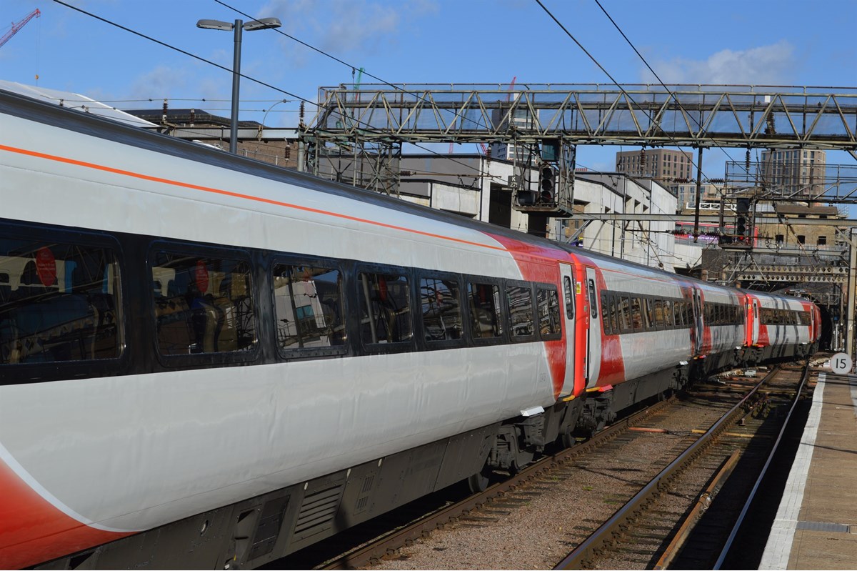 The rake of newly-liveried coaches from set BN03, having just arrived from being treated at Bounds Green depot.