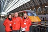 Red Virgin wind jackets, worn by these staff at King's Cross, are the first part of a new uniform which will be introduced in the months ahead.
