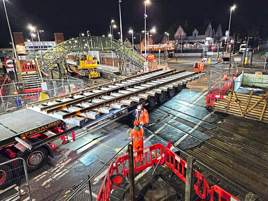 Network Rail engineers upgrade a level crossing at Wokingham in February, as part of the Feltham and Wokingham Area Resignalling project. NETWORK RAIL.