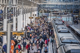 Commuters at London Paddington station on February 11, 2021. JACK BOSKETT