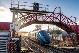 Ravensthorpe, where then-Rail Minister Huw Merriman took part in a ceremony last December, the same month the full £3.9 billion scheme was formally announced. In future, Ravensthorpe will be home to a flying junction. TransPennine Express 802212 rolls towards the station in February 2021. MIKE BROOK.