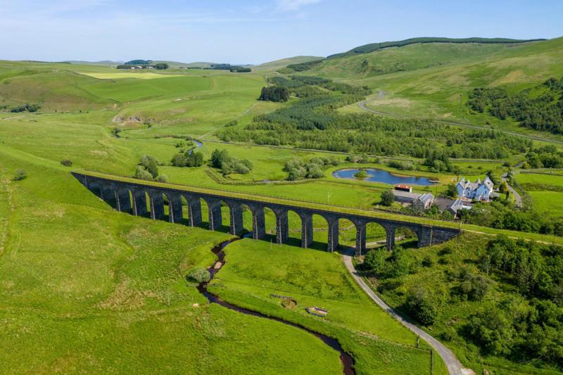 The Shankend viaduct near Hawick in the Scottish Borders. The viaduct on the Waverley Line was closed down in 1969 as a result of the Beeching report. ALAMY.