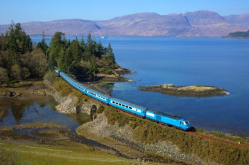 The potential of Britain’s scenic lines is appreciated - and taken advantage of - by private operators such as Locomotive Services Limited, which runs ‘Midland Pullman’ HST excursions. On March 22 2022, 43055 leads 43046 along the shores of stunning Loch Carron, while running between Kyle of Lochalsh and Inverness. JAMIE SQUIBBS.