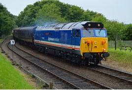 50026 Indomitable approaches Weybourne on June 10. DARREN FORD.