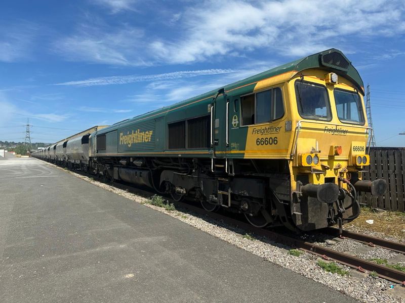 Freightliner 66605 at Newport Docks with a train of aggregates containing a high PSV rating which was brought form Hafod Quarry by road. FREIGHTLINER.