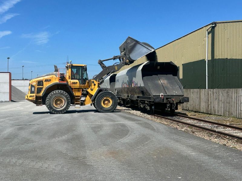 Stone with a high PSV rating is loaded into wagons at Newport Docks before being taken to Radlett for Tarmac. FREIGHTLINER.