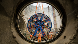 An HS2 tunnel boring machine is lowered into position.