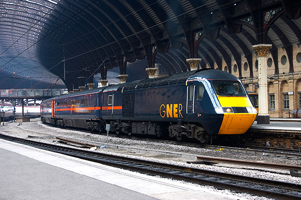 Perry was NR’s Route Director for LNE and Midlands & Continental in 2004-08, covering a patch that included the busiest sections of the East Coast Main Line. On February 5 2005, an HST led by power car 43197, in the colours of then operator GNER, is at York with a train for Glasgow. ALAMY