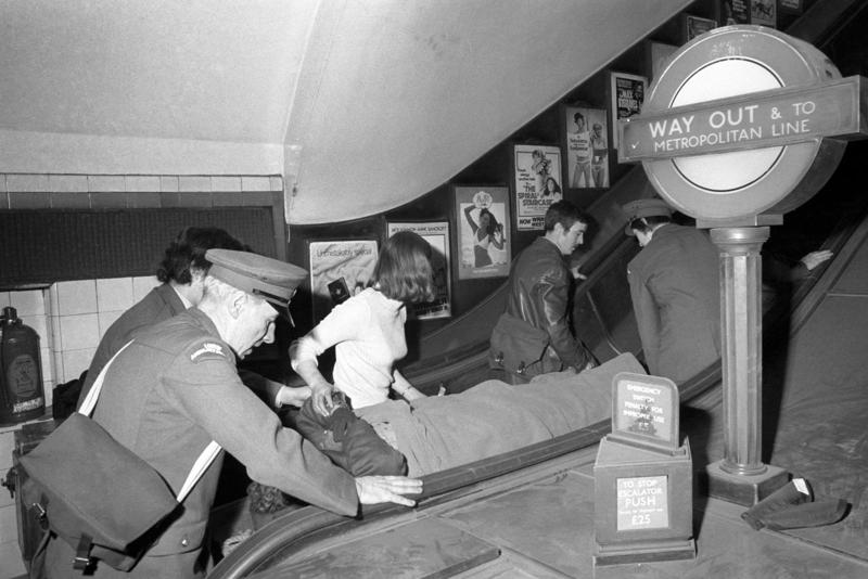 Rescuing the injured meant carrying them through the confines of the Underground station and up to street level via its escalators. ALAMY.