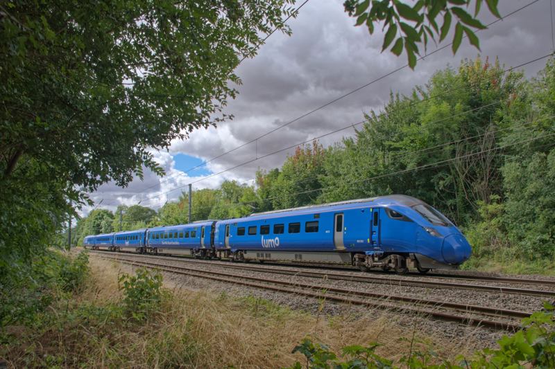 803002 working Lumo's 1S93 1045 Kings Cross to Edinburgh through Little Ponton in Lincolnshire on August 5 2022. PAUL CLARK