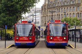 Sheffield Supertram 124 and 123 pass at Cathedral on June 7 2022. The system is back under local control after Stagecoach relinquished operations in March of this year. TONY WINWARD.