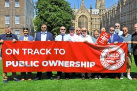 ASLEF executives and supporting MPs gather on July 29 outside Parliament on College Green, to mark the second reading of the Passenger Railway Services (Public Ownership) Bill later that day.