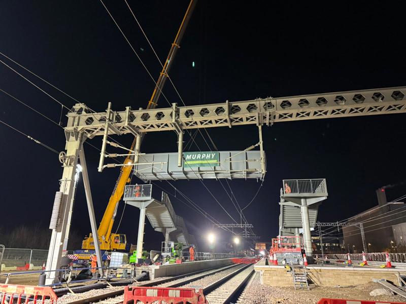 Footbridge being installed at Cambridge South station. NETWORK RAIL.