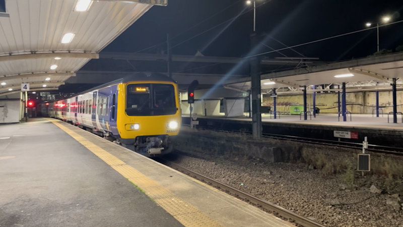 Northern Class 323 unit arrives at Bolton in the early hours of June 3 after becoming the first electric-powered train to run from Wigan. NETWORK RAIL.