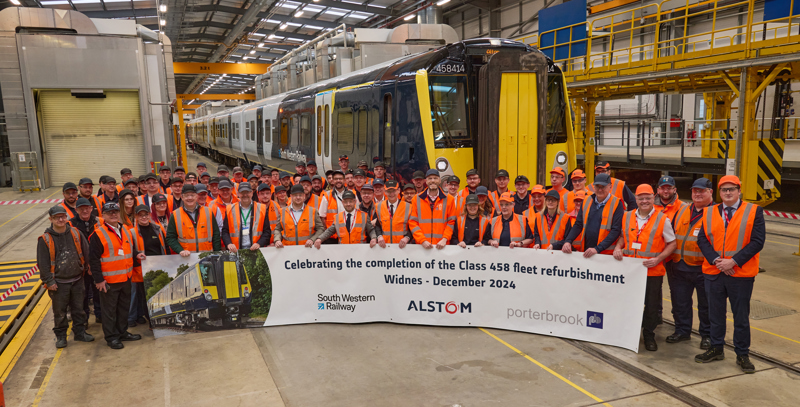 Staff celebrate the completion of the Class 458/4 refurbishment programme for South Western Railway at Alstom’s Transport Technology Centre in Widnes on December 12. CAROL TAYLOR.