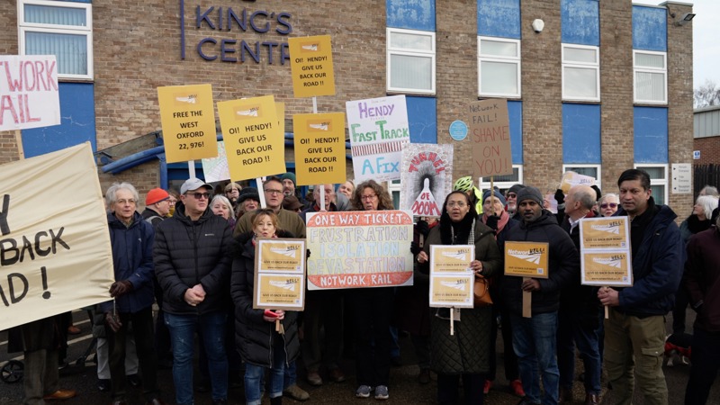 Around 100 protestors greet Rail Minister Lord Hendy in his visit to Oxford's Botley Road on January 24. JONO EDEN.