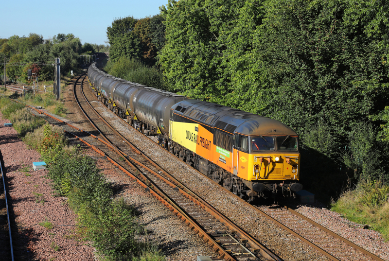 Colas Rail 56051 passes Lostock Hall Junction on September 17 2024 carrying Ribble Sidings Preston- Haverton Hill empties. PHIL METCALFE.