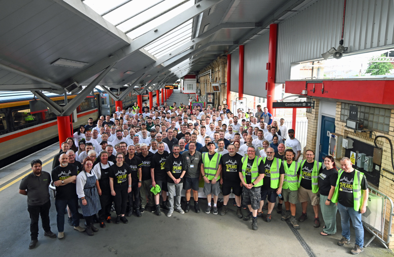 The teams and volunteers pose for the camera at Crewe before the challenge begins. PAUL BIGLAND